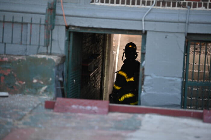 firefighter in apartment building