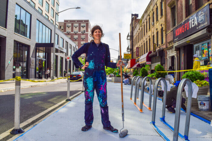 Brooklyn artist, Ann Tarantino, designed the ground murals and helped paint them on the popular downtown streets.