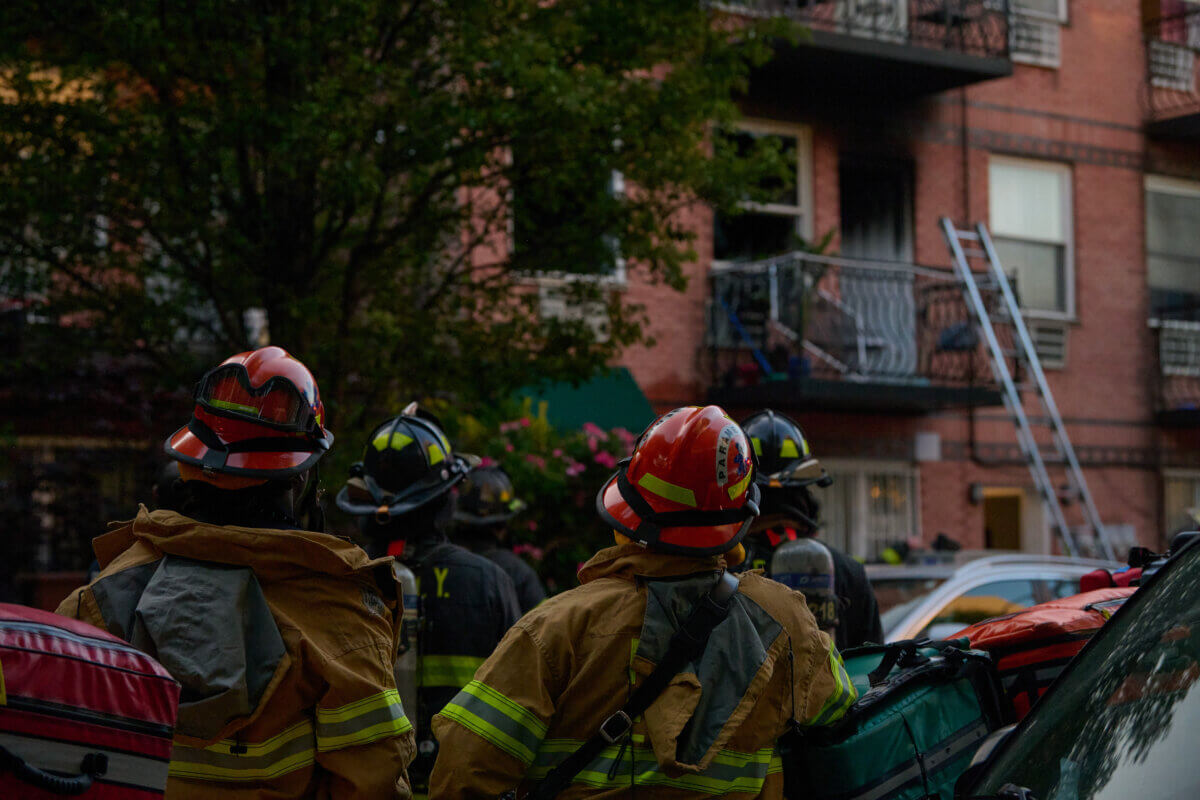Firefighters and paramedics respond to an all hands fire at 107 Pilling St. in Bushwick on Monday evening.