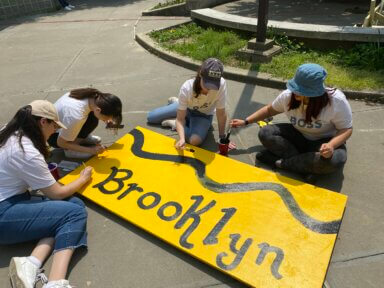 A team of do-gooders partner to beautify the The Child Center of New York outdoor campus.