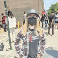 Television writer Sasha Stuart protests in Greenpoint as part of the strike.