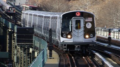1200px-MTA_NYC_Subway_J_train_approaching_Flushing_Ave