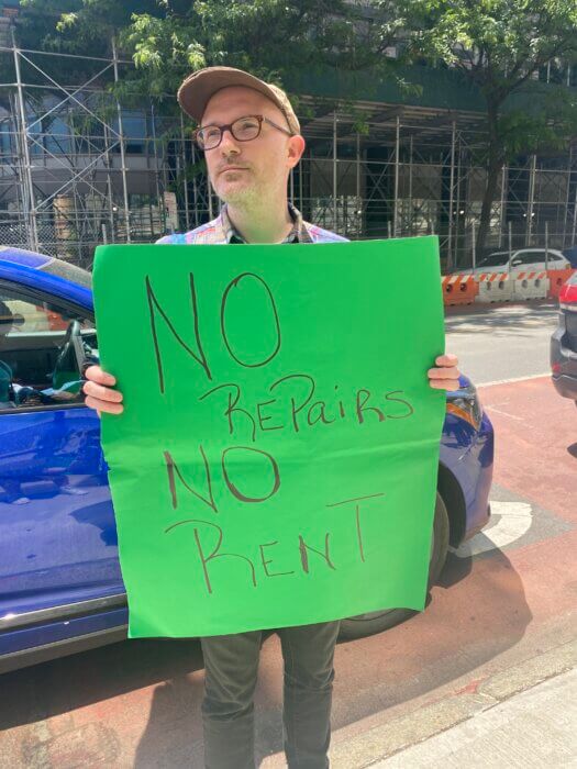 Bryan Welton stood in support of his neighbor on June 5 outside the Brooklyn Housing Court.