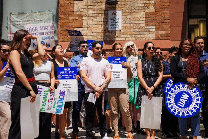 people on brooklyn defender services picket lone