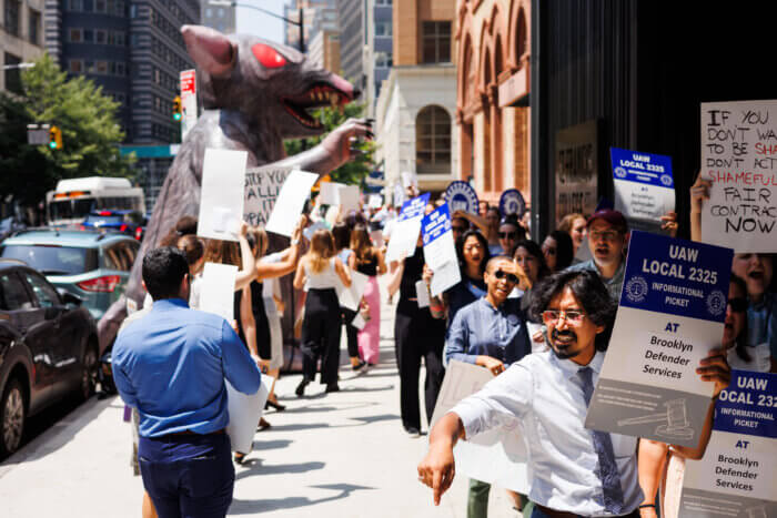 Brooklyn Defender Services Union members picket outside their Downtown Brooklyn office on Wednesday, July 26, 2023. The public defenders picketed for movement toward a fair contract.