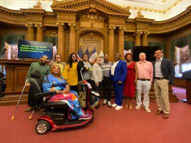 antonio reynoso with speakers at disability pride event