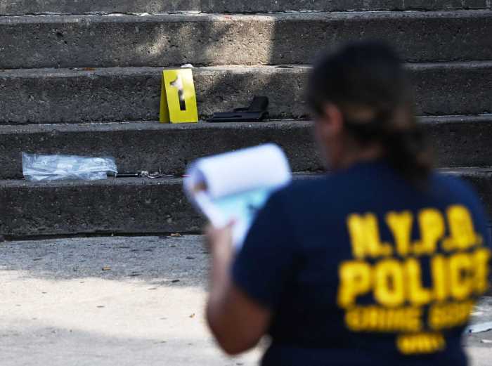 officer outside bedford-stuyvesant building