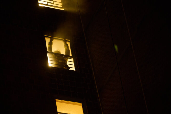 firefighter in window of starrett city fire