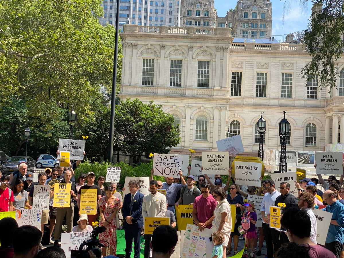 crowd at mcguinness boulevard rally at city hall