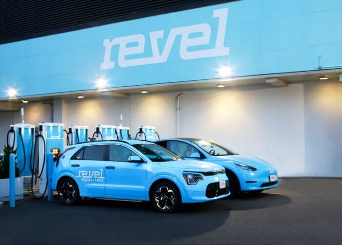 cars charging at revel hub