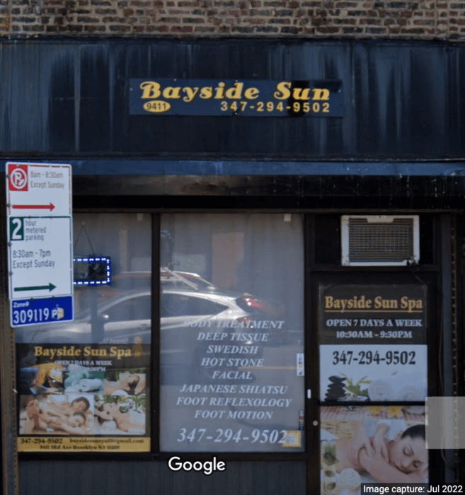 A Bay Ridge massage parlor with covered windows has received zoning and construction violation.