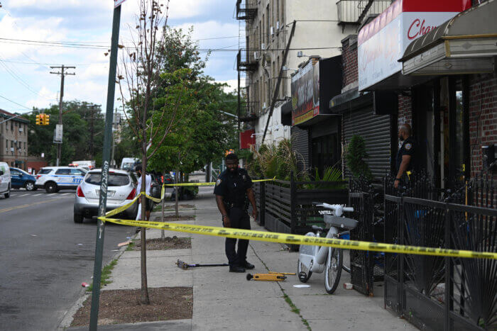 NYPD investigates a double shooting in Brownsville barber shop on Aug. 1.