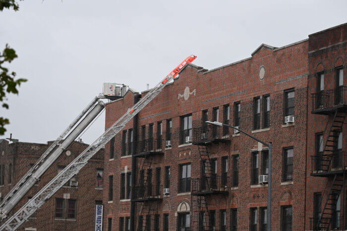 ladder at top of east flatbush building fire