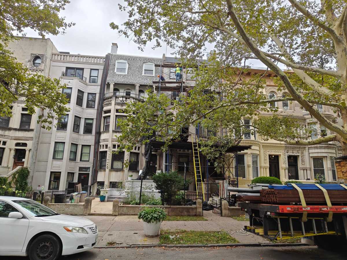sidewalk shed outside crown heights building