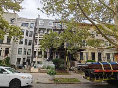 sidewalk shed outside crown heights building