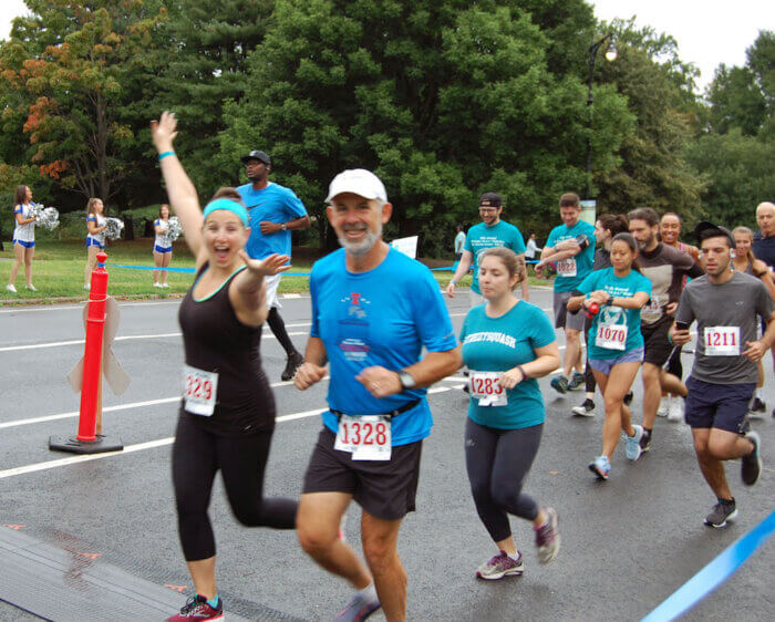 people running in park for T.E.A.L. ovarian cancer run