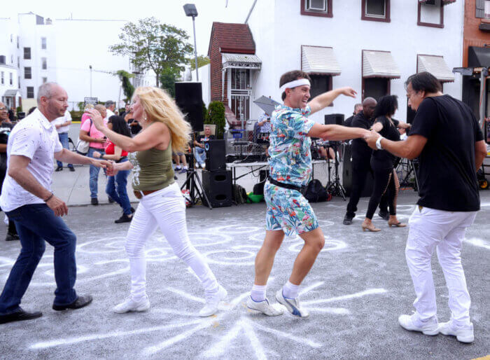 people dancing at third avenue festival