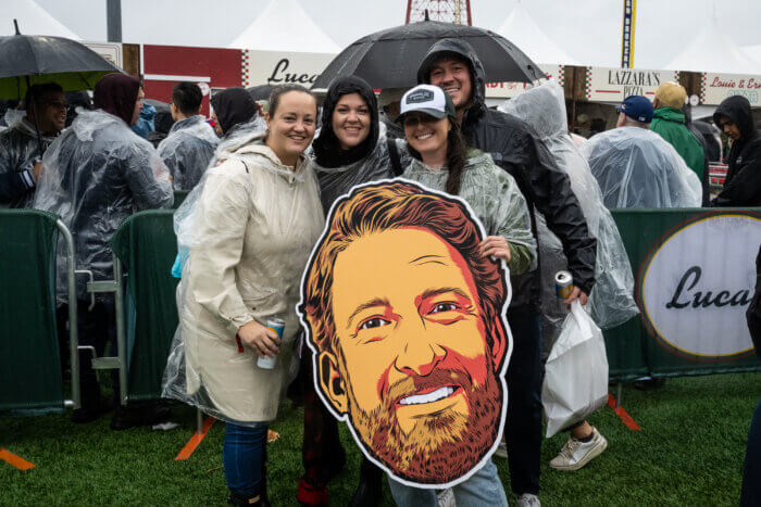 fans with cutout of Dave Portnoy's head