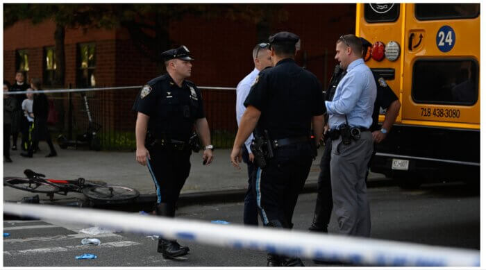 cyclist hit by school bus