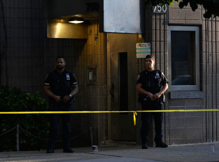Officers from Police Service Area 3 and 81 Precinct at the scene of a double shooting.