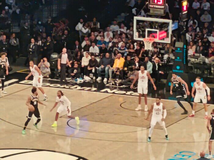 basketball players at nets game