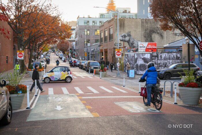 person biking on berry street