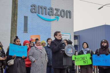 lawmakers in front of amazon e-commerce warehouse in red hook
