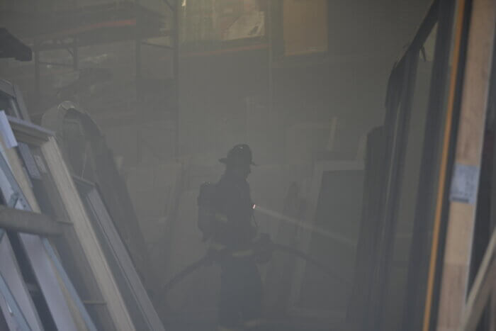 firefighter in thick smoke in Bushwick