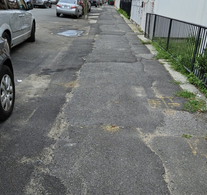 Locals say the ugly walkways were the result of a sewer project that was completed but never officially buttoned up.
