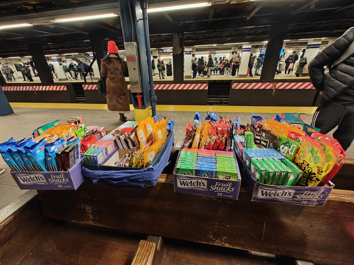 a candy stand set up by an immigrant worker at Jay Street