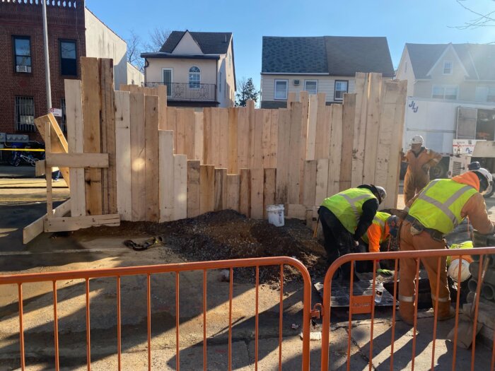 crews filling sinkhole