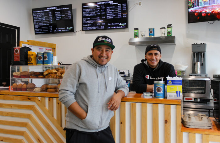 owners of cafe xoco-latte behind counter