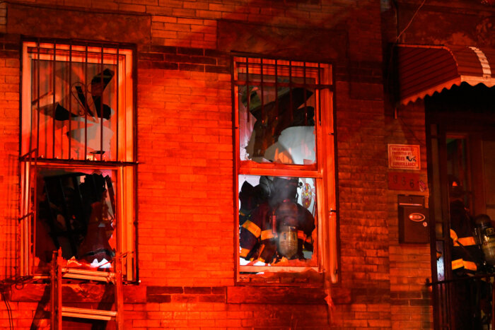 firefighters inside sunset park building