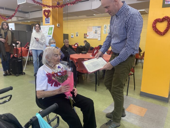 jeanette bigelson getting 104th birthday certificate