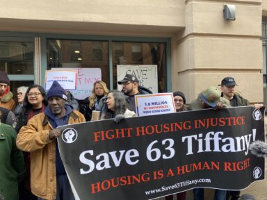 Residents of 63 Tiffany Place rally for legislature that would prevent landlords from pushing out longterm tenants.