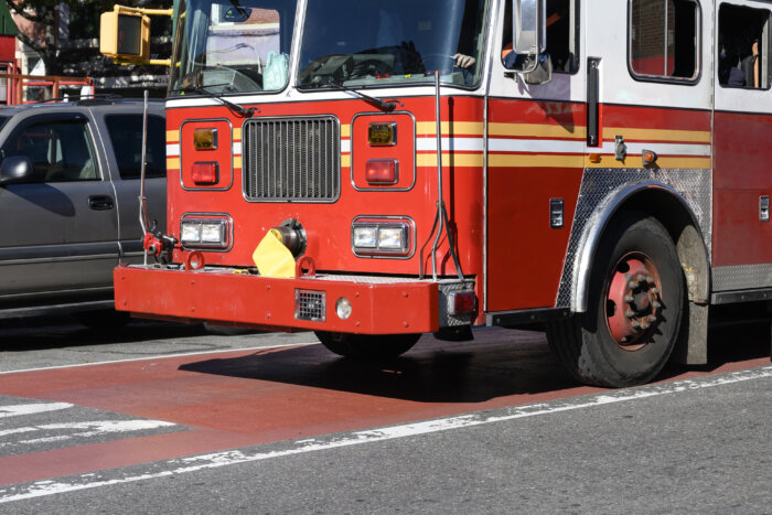 Fire truck stopped in Manhattan, New York.Fast fire engine in Manhattan, New York City.
