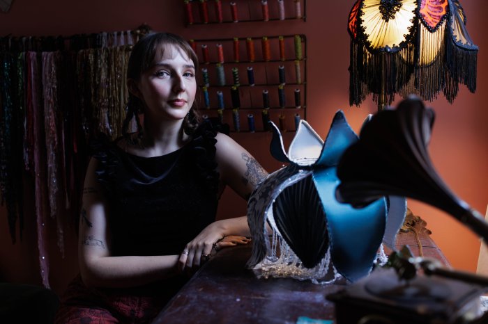 Ivy Karlsgodt poses for a portrait inside her Bedford-Stuyvesant home studio on Tuesday, March 5, 2024. Karlsgodt hand makes lamp shades for her business, Ace of Shades.
