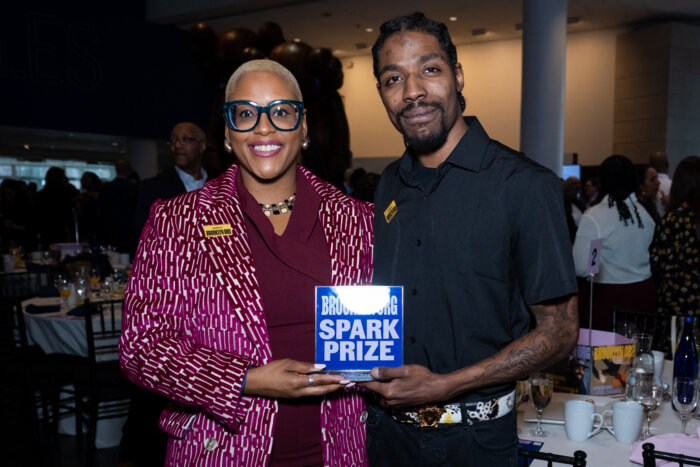 people from drive change pose with spark prize