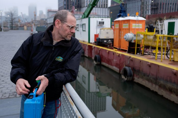 Gary Francis looking at Gowanus Canal