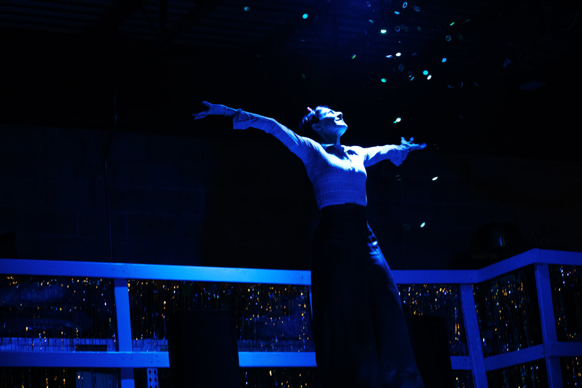 woman on stage in remember this trick
