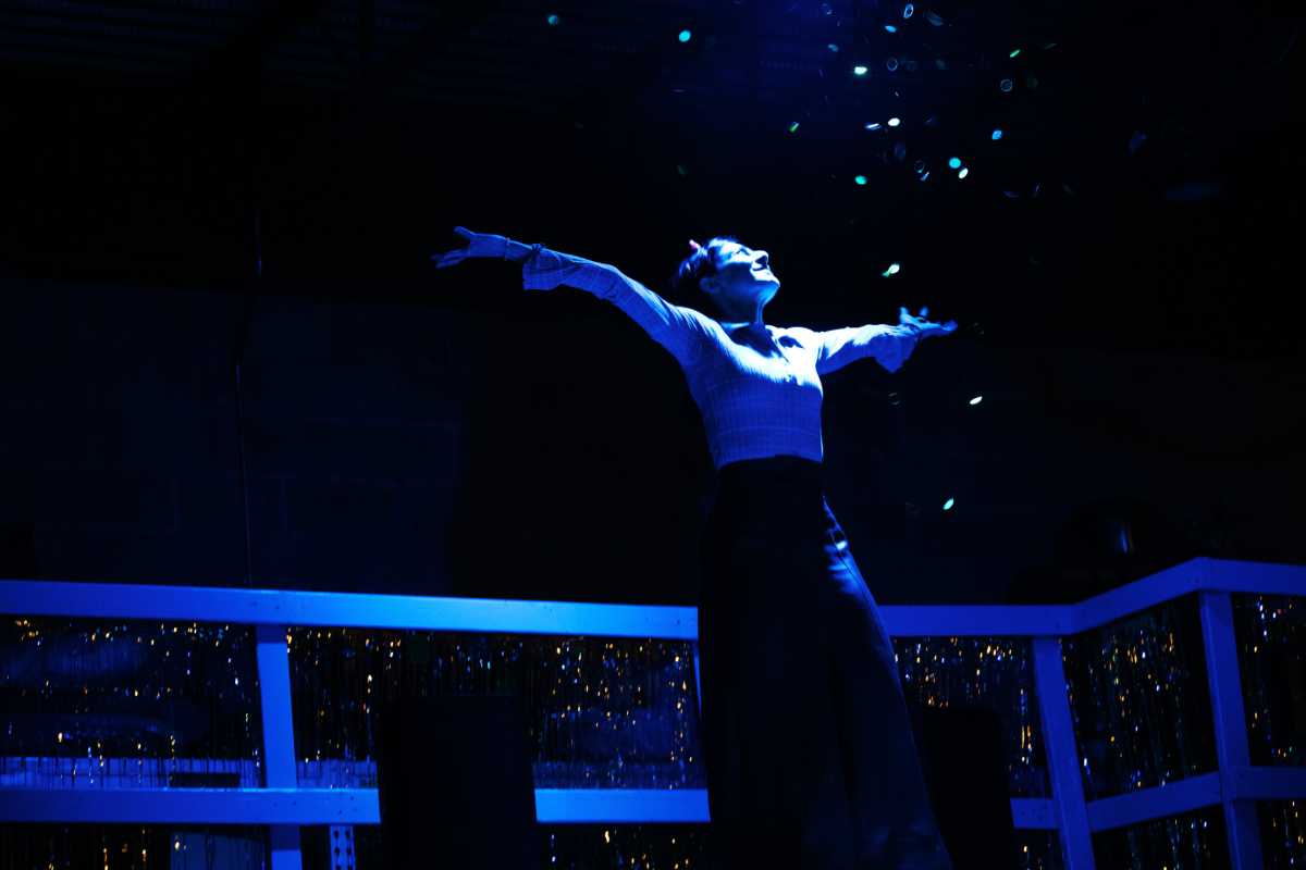 woman on stage in remember this trick