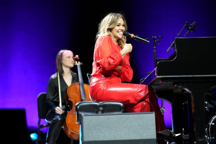 Platten shared her popular hit "Fight Song" with fans and cried as they cheered for her at the concert