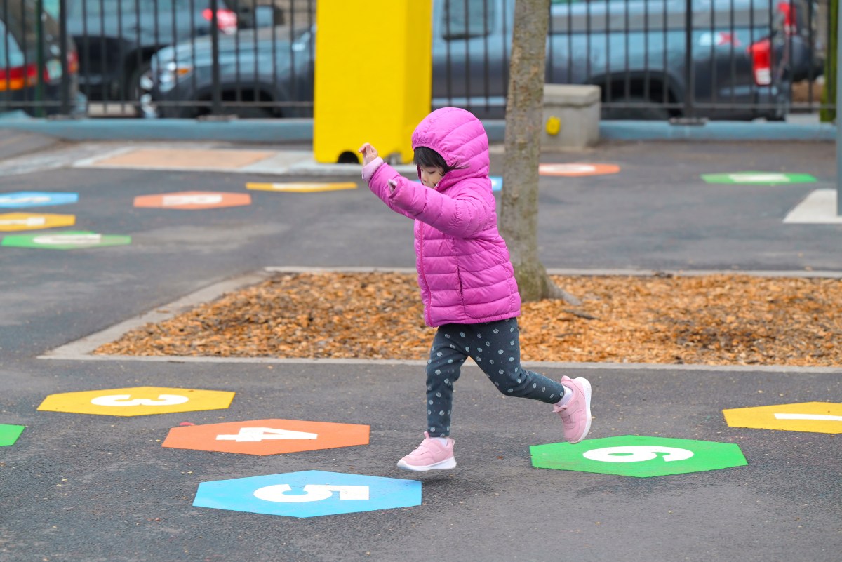 kid at rainbow playground