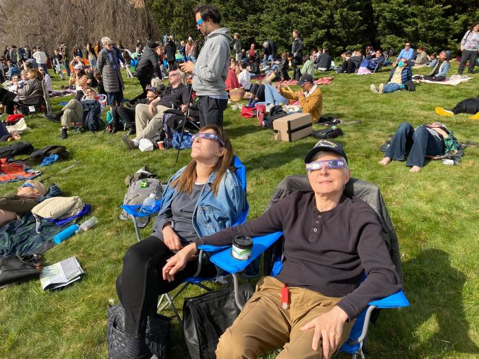 people in lawn chairs at Green-Wood