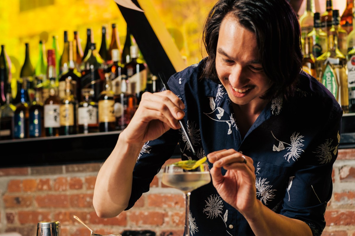 bartender mixing cocktail at Koi Bā speakeasy