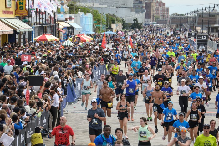 people running on boardwalk at Brooklyn Half Marathon