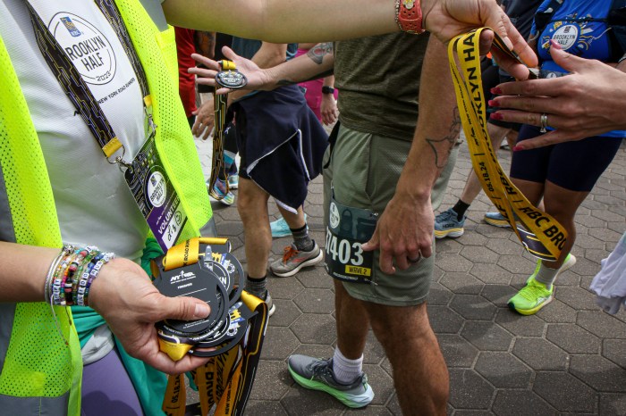 medals at brooklyn half marathon