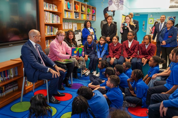 david banks reading to students