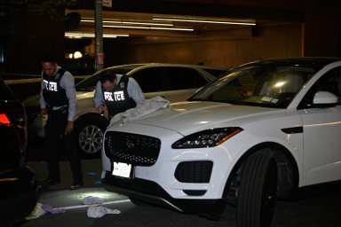 police on scene of Williamsburg carjacking