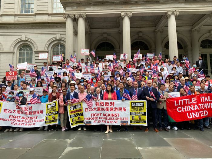 rally against shelter in gravesend city hall